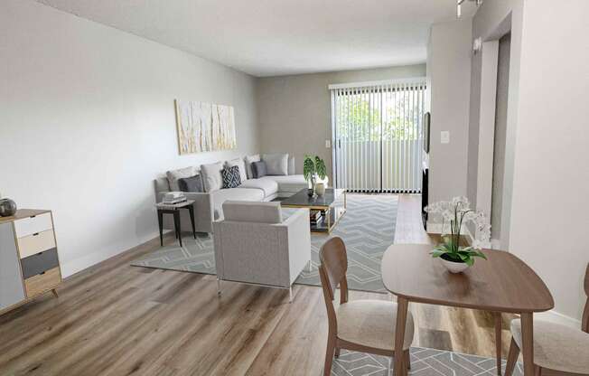 a living room with white walls and a wooden floor