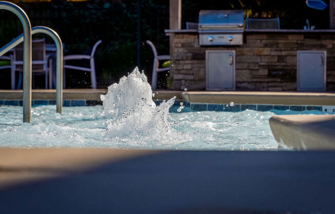 a splash of water in a swimming pool