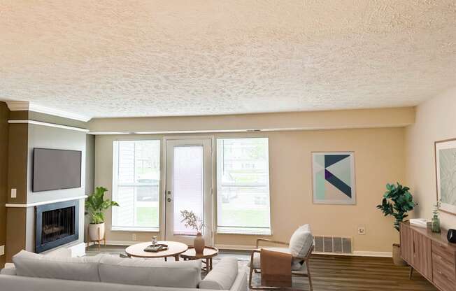 Renovated Open living room at Pine Lane Estates Apartments in Lansing, MI