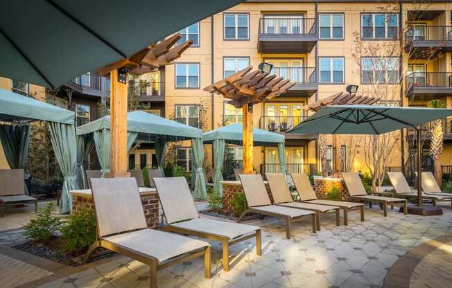 A sunny day at the outdoor seating area of a hotel.