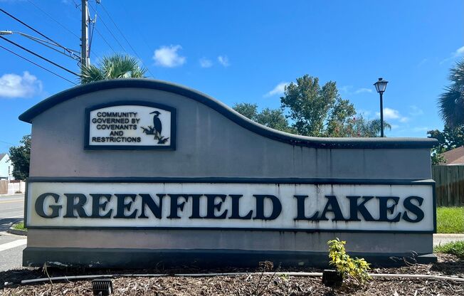 Lovely home with sunroom in Greenfield Lakes