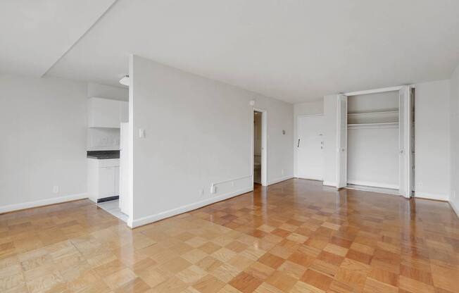 A room with a checkered floor and white walls.