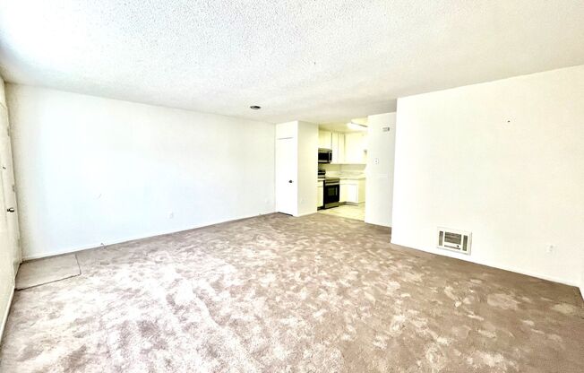 Upper Level Apartment with Many Upgrades!