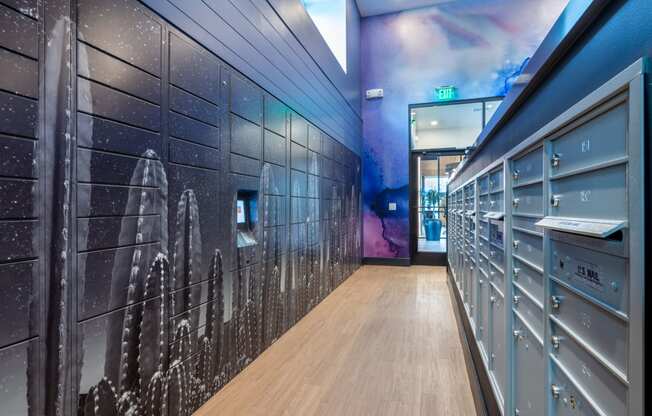 a hallway with lockers and a mural of a space shuttle