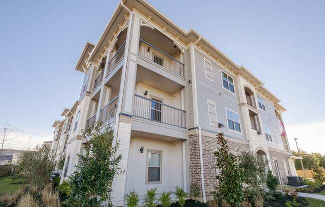 Property Building Exterior at Cue Luxury Apartments, Cypress, TX, 77433