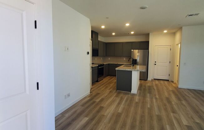 Beautifully designed modern townhome with attached garage.