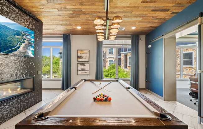 A pool table with a billiard ball on it.