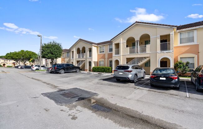 2-bath condo on the 2nd floor with a newly renovated kitchen featuring modern cabinets and granite countertops.