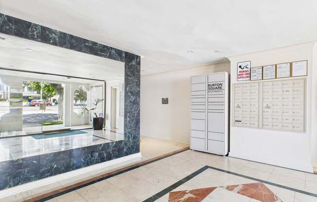 A reception area with a Burton School sign on the door.