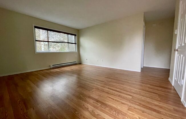 Don't Miss Out! Amazing Sunnyside Location~ Upstairs Unit, Updated Throughout~ 90 Walk Score, 98 Bike Score~ Off Street parking~ Free Laundry!