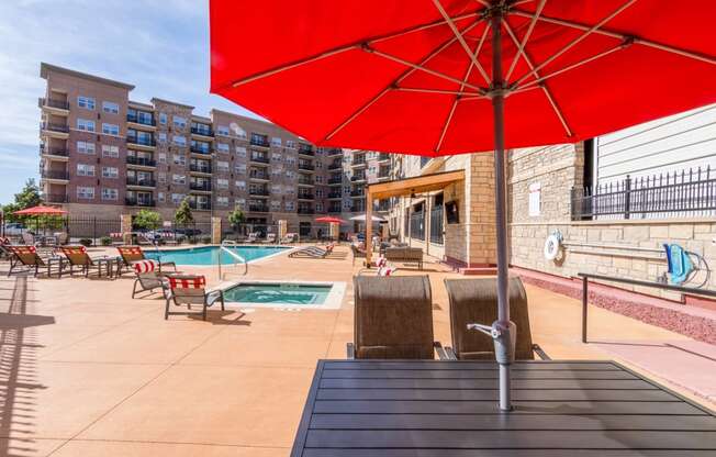 our apartments have a pool and lounge area with umbrellas