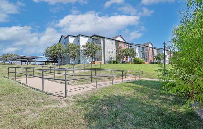 Rampway with apartments and parking lot in the background at Ultris Island Park in Shreveport, LA