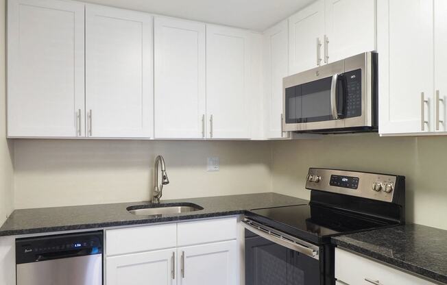 Kitchen with appliances at The Packard, West Hartford, 06119