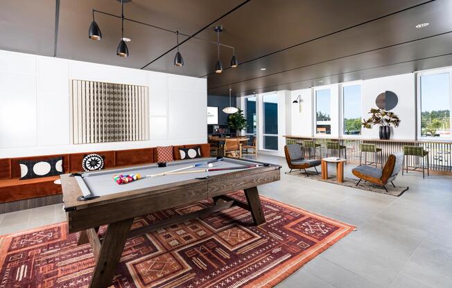 Let the games begin at Modera Raleigh Hills! Our vibrant game room is decked out with billiards, shuffleboard, and a poker table—perfect for friendly competition or unwinding after a long day.