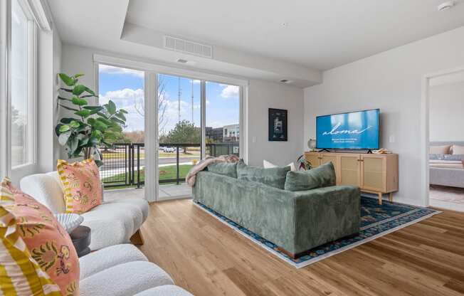 a living room with a couch and a tv