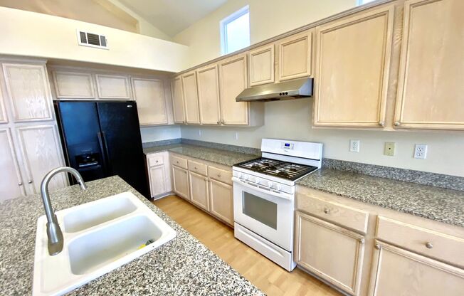 Perfect family home in Rhodes Ranch guard gated golf course community with a full bedroom and bathroom on the first floor!