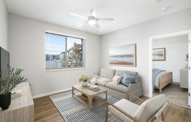 Living room with couch and ceiling fan