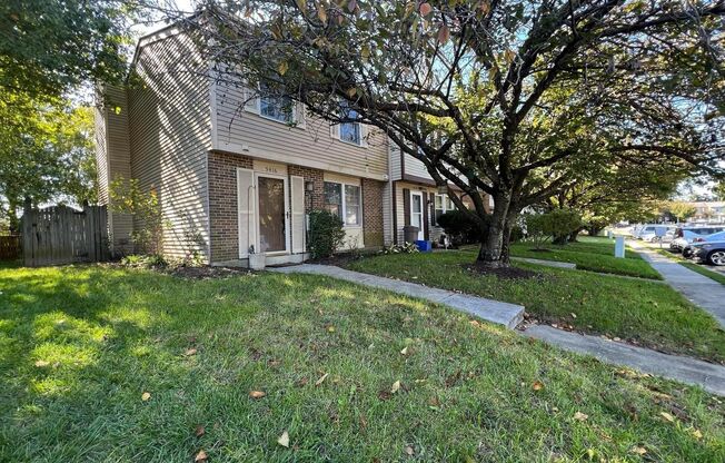 Welcome to this chic 3 bedroom end of group townhome in Queen Anne Village.