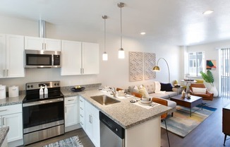 Strata99 Townhomes Apartments Kitchen and Model Living Room