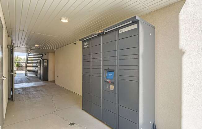 the front door of an apartment building with a locking door