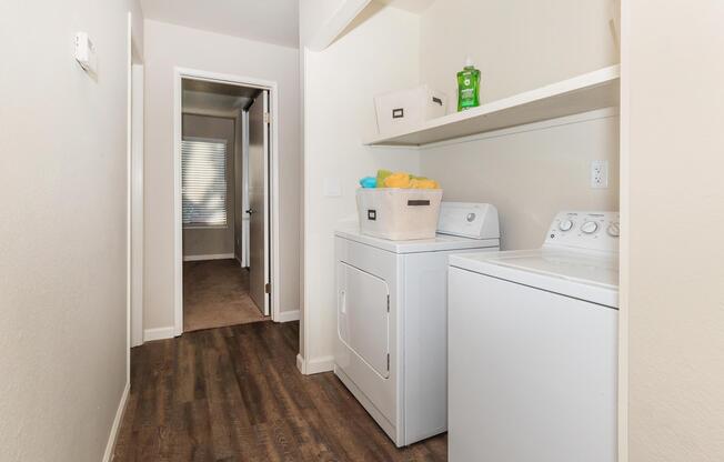 a kitchen with a sink and a refrigerator