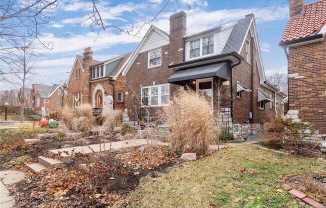 This charming gingerbread home in St. Louis Hills blends modern updates with classic appeal.