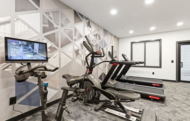 Cardio equipment in the Fitness Center at Switchback on Platte Apartments, Colorado, 80120