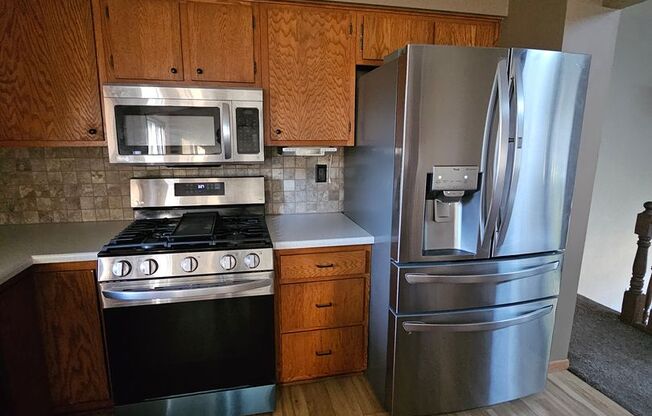 3 bedroom 2 bath with additional lower level family room in great NE location near I380