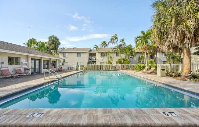 A swimming pool with the number 6F painted on the side.