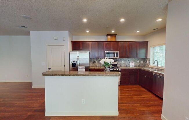 LEASE SPECIAL - $300 OFF 1ST MONTHS' RENT! Close To MAX!  Single Car Garage Included