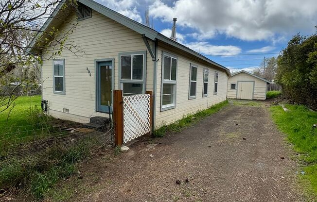 3 bed 1 bath house with large yard/garden area - will consider one pet