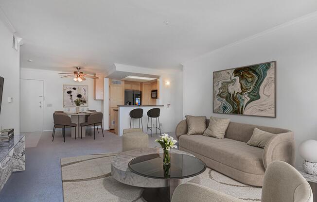 a living room filled with furniture and a fireplace