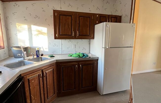 Country living close to town on 1 acre!