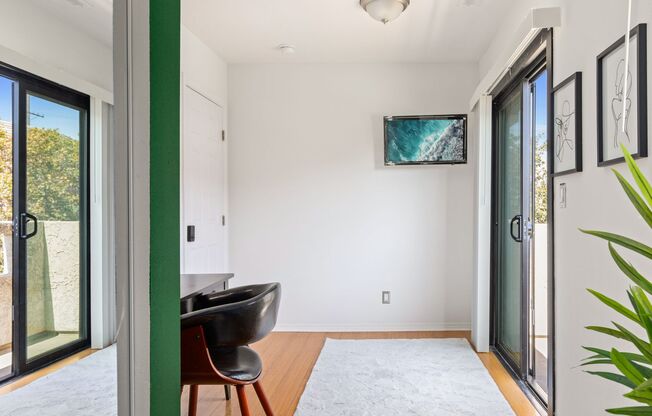 A fully furnished 4 bedroom, 2 bathroom apartment with common areas at 1823 Pelham Ave. Unit 5
