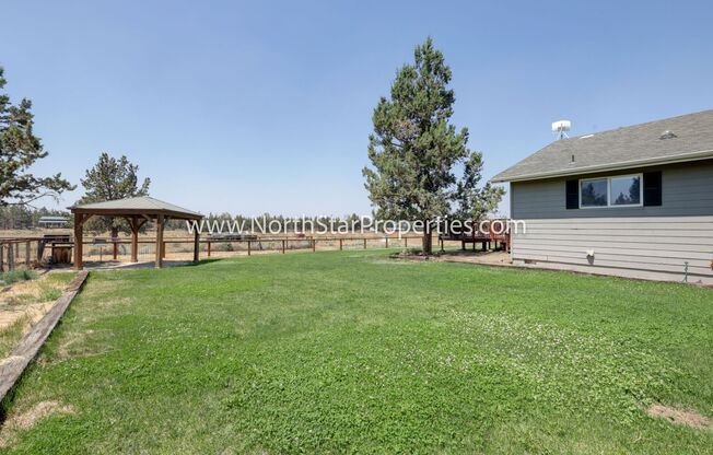 Beautiful Bend property with paddocks and land.