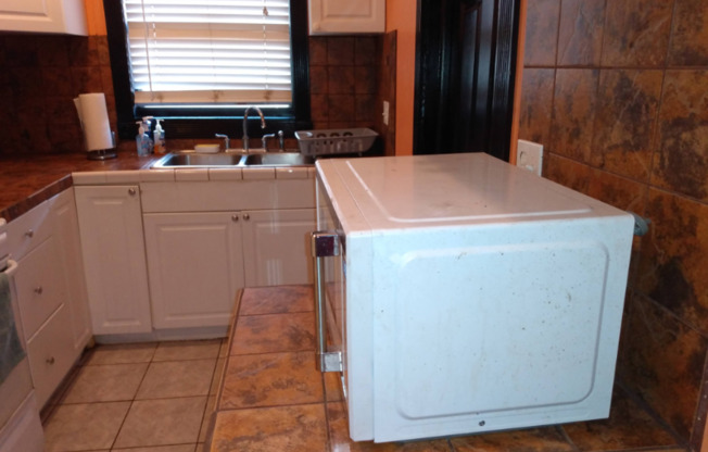 6434 MOCKINGBIRD LN S