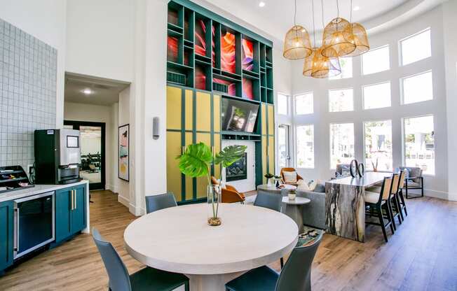 Octave Apartments clubhouse table and living room at Octave Apartments, Las Vegas, NV, 89123