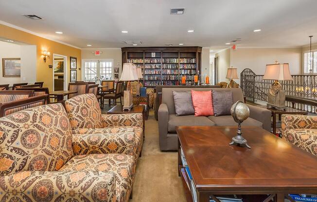 a living room filled with furniture and a fire place