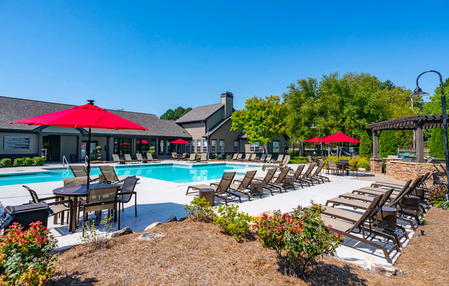 our apartments offer a swimming pool with chairs and umbrellas