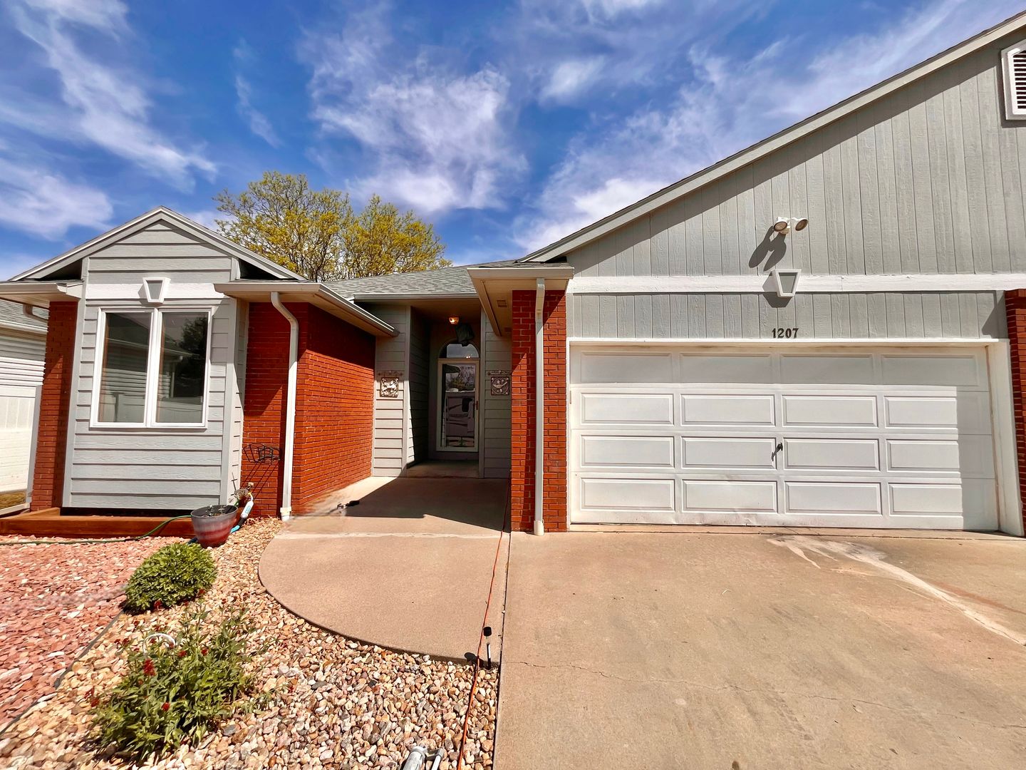 Spacious 3 bedroom/3 bath Townhome with 2 car Attached Garage and Private Yard in Evans, CO