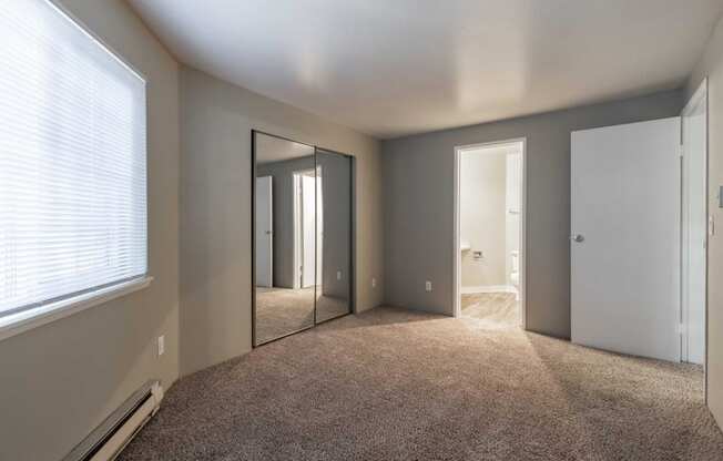 Cascadia Pointe Apartments in Everett, Washington Bedroom with Attached Bathroom