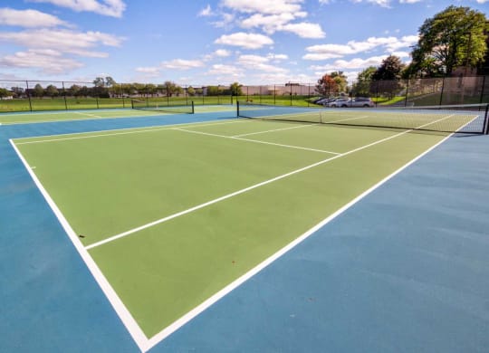 Resident Tennis Courts At Iroquois Club Apartments In Naperville, IL