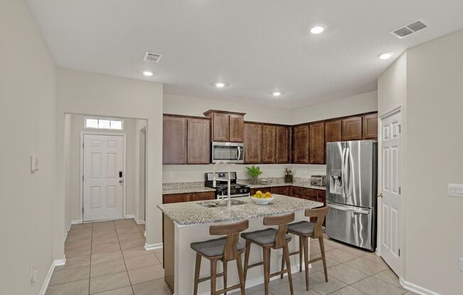 Modern 3 Bed 2.5 Bath Townhome. Garage. Lanai. Amenities. Pet Friendly. Lawn Care Included! $500 Off Rent!! Application Fee and Lease Fee Waived!