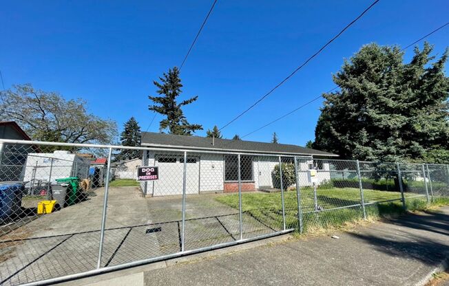 Updated Lents Charmer with Attached Garage~ New Flooring~ Large Fenced Yard & A/C