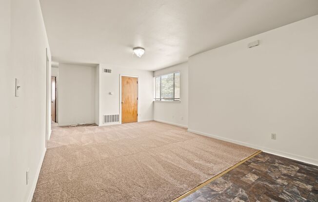 Utilities Paid! Freshly Updated 3 Bedroom with Parking & in-unit Laundry