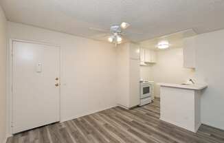 Dining Room with Hardwood Floors and Fan