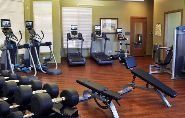 Fully-Equipped Gym at Aurora Co Apartments