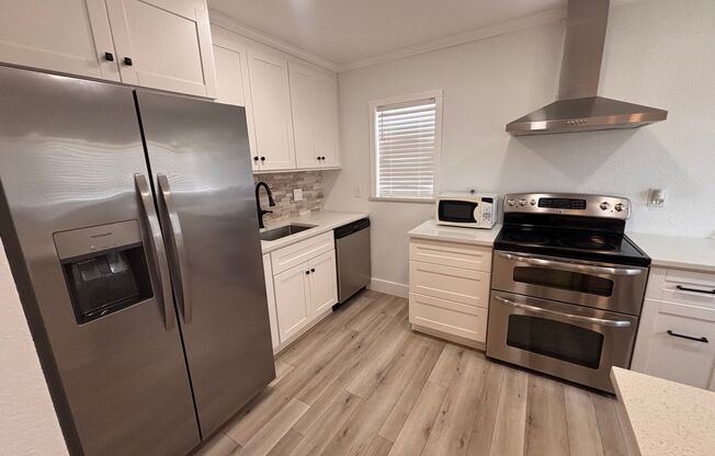 Updated 3BR in Jacksonville Beach! Spacious Fenced Yard & Lawn Care Included!