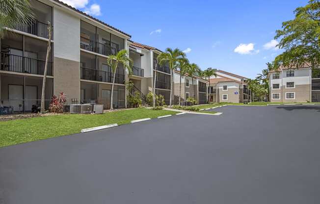 a view of a building at the whispering winds apartments in pearland, tx