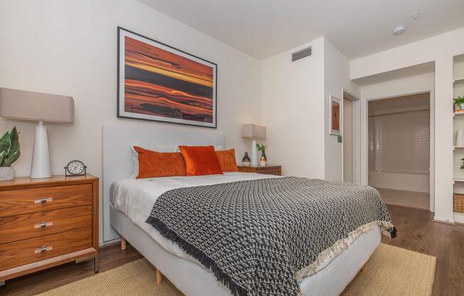 a bedroom with a large bed in a room
